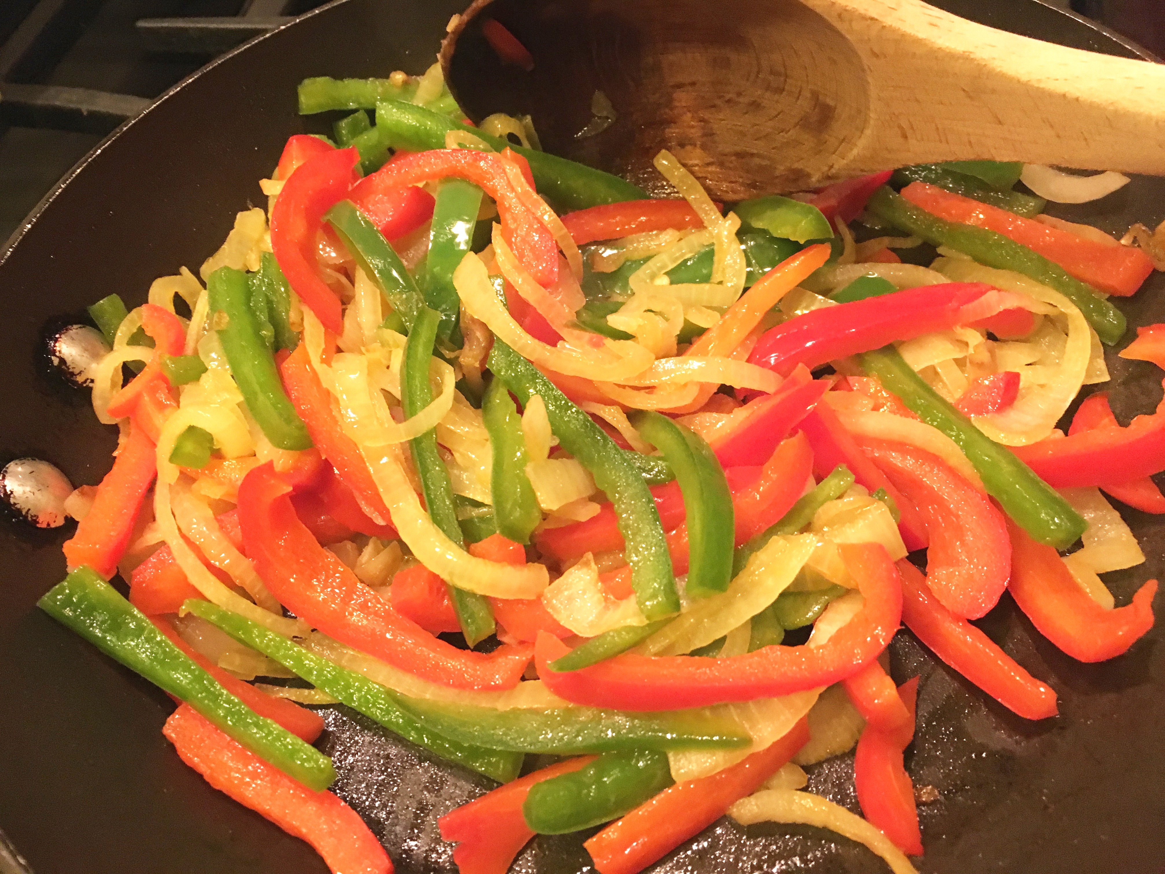 Sauteing my peppers and onions...