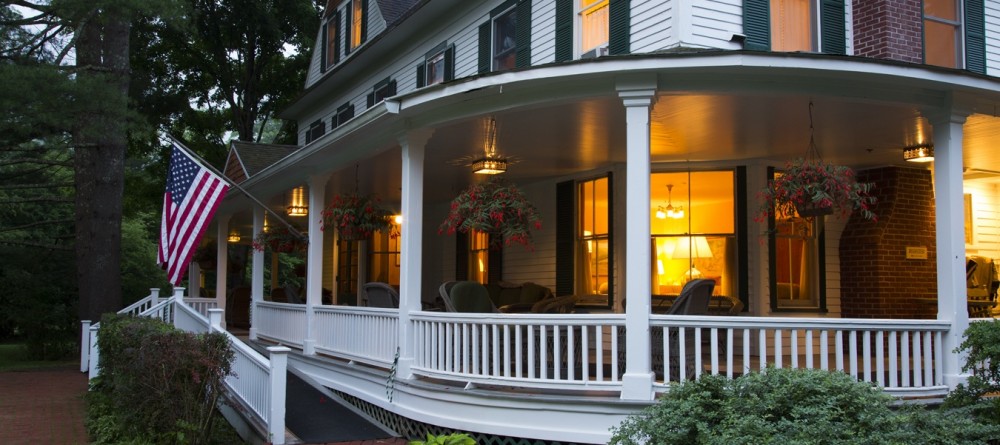 Imagine an sipping a cocktail on this wraparound porch after a day of fly fishing in the Catskills.